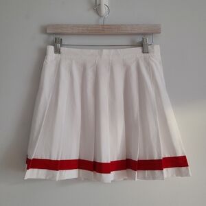 Pleated White Skirt with Red Trim